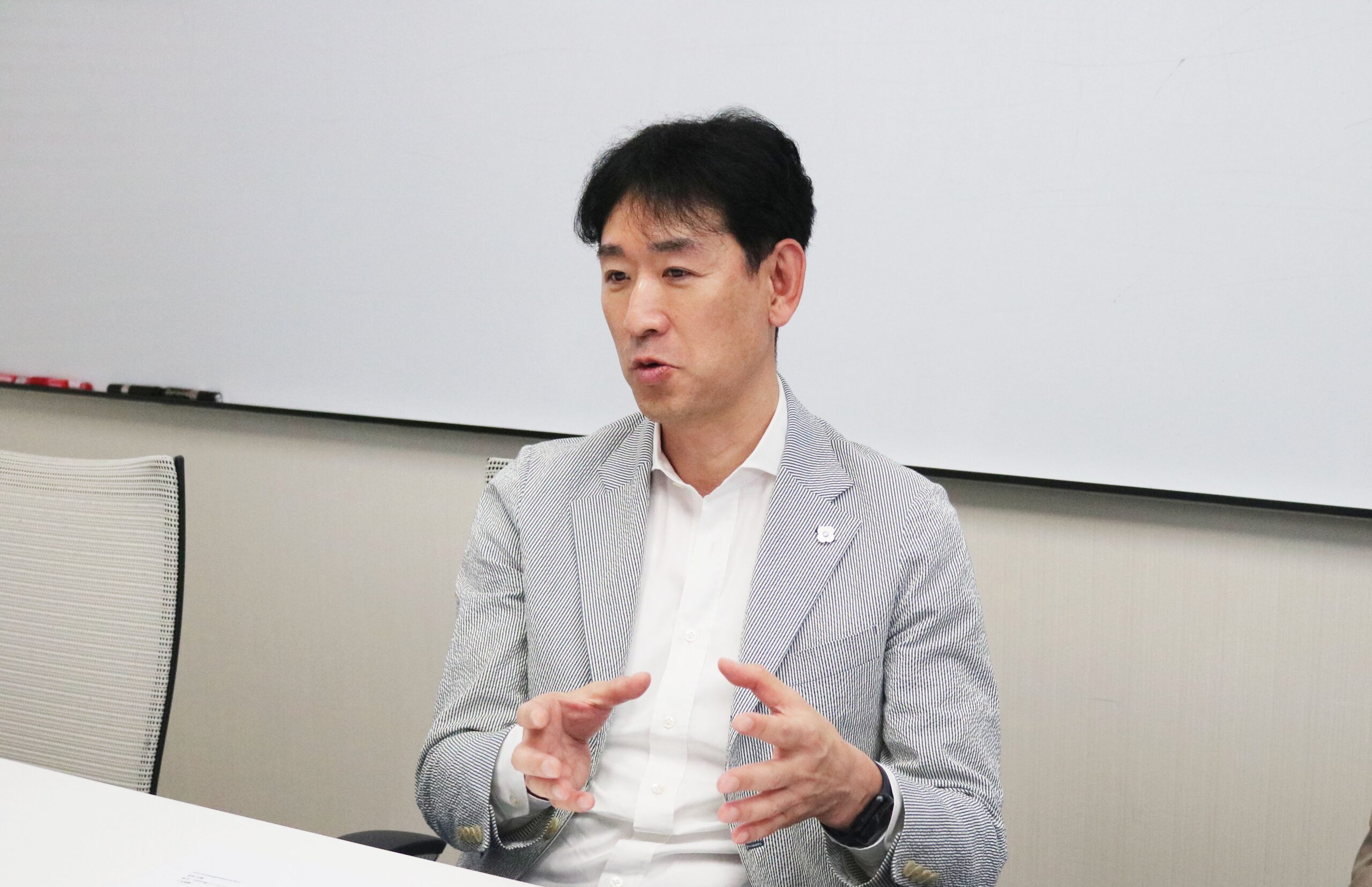 インタビューに答えるヒューリックのご担当者